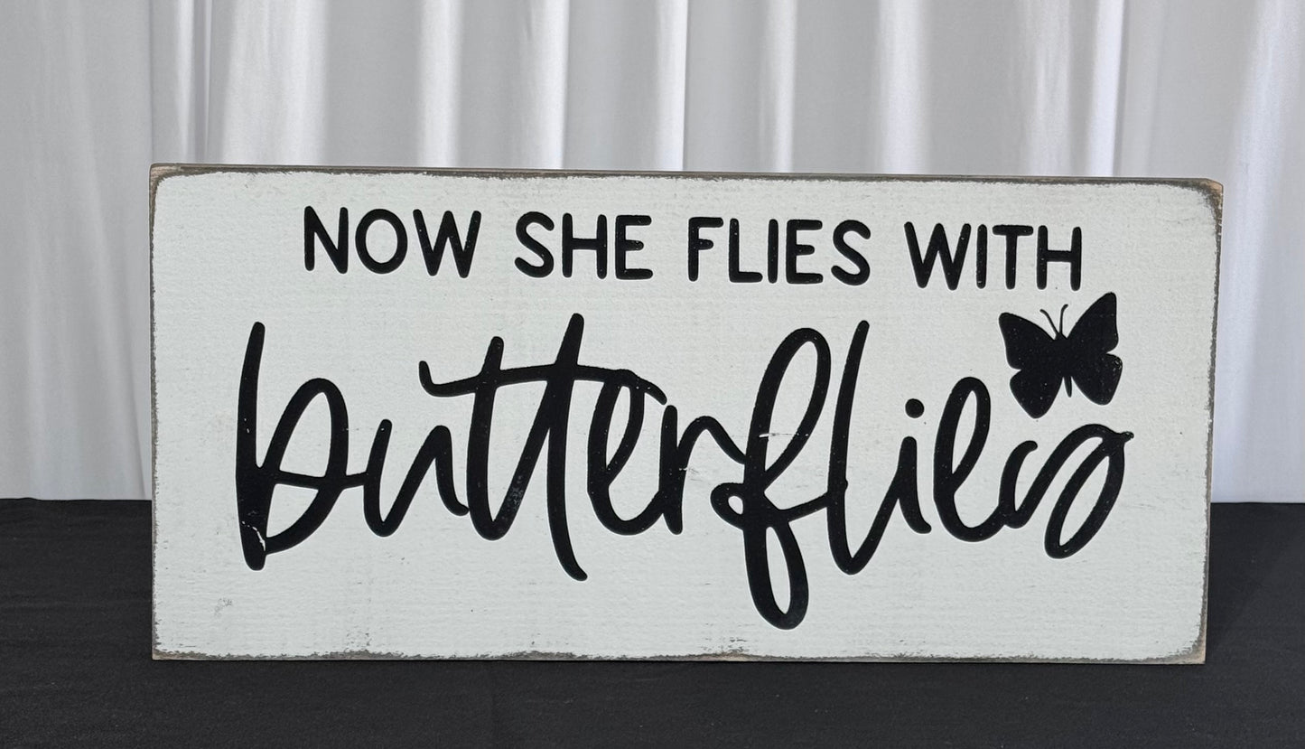 Now She Flies Sign